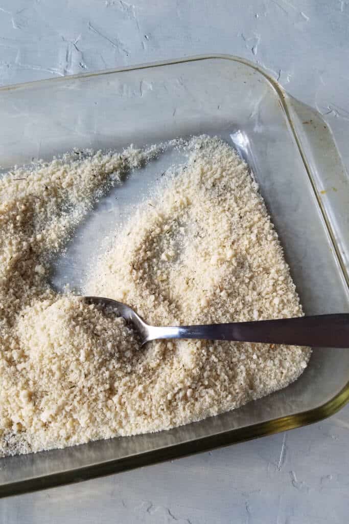 panko and parmesan cheese mix in casserole dish