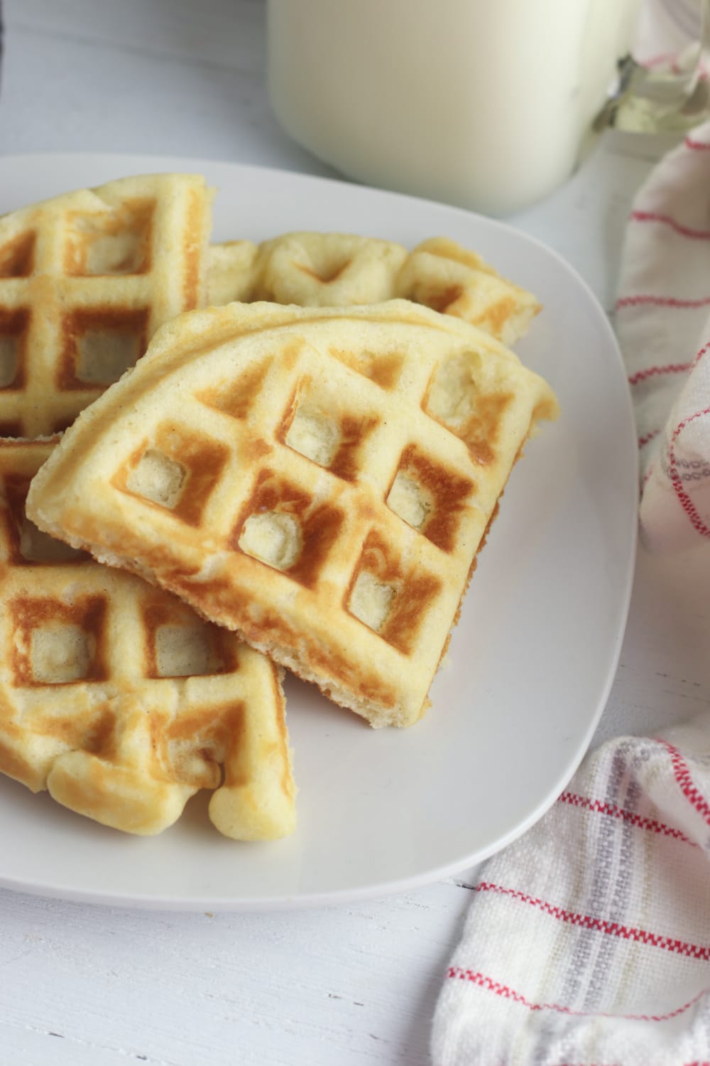 homemade gluten free waffles on white plate