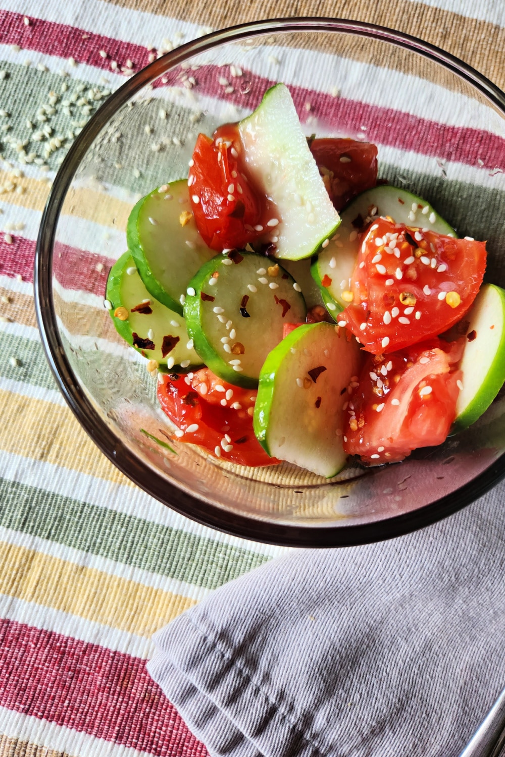 Cucumber salad with grey napkin