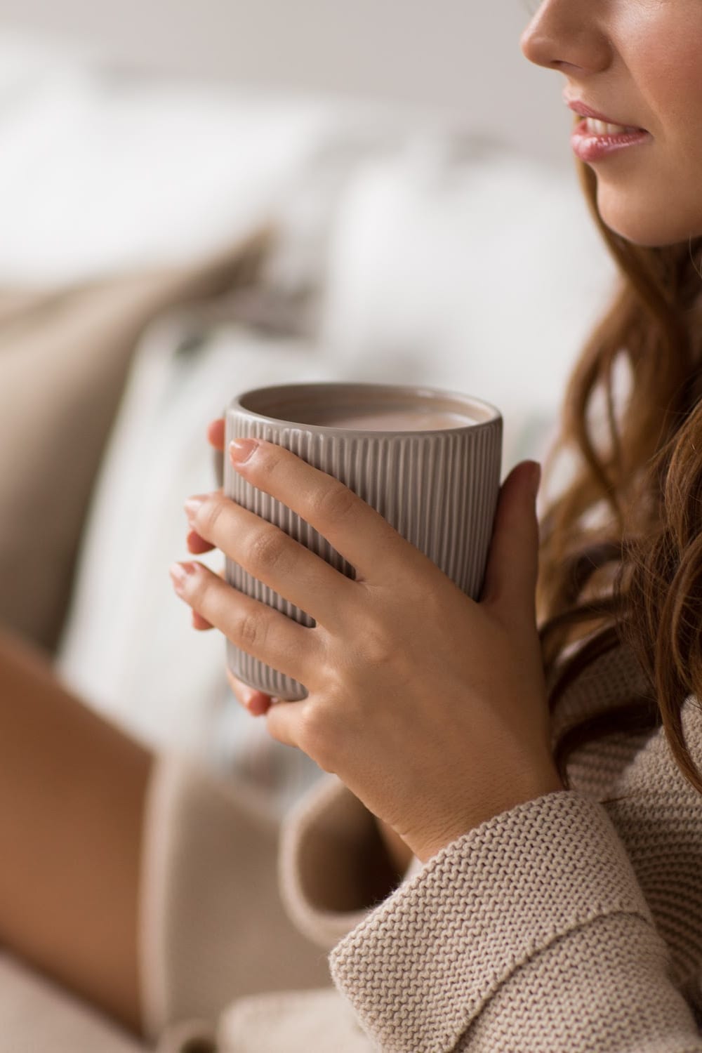 woman holding mug in hand - stress out of Christmas