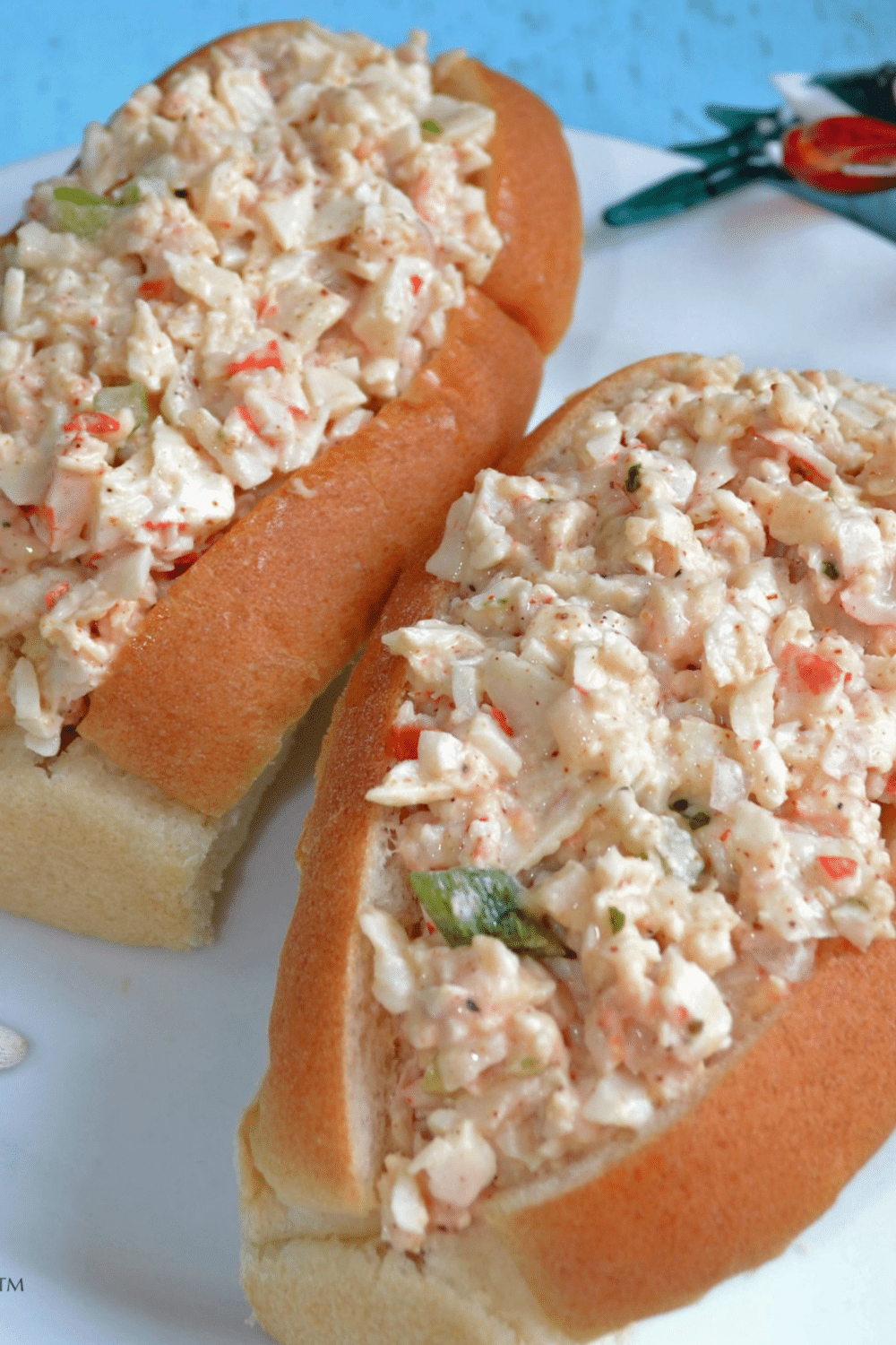 fake crab sandwiches on white plate