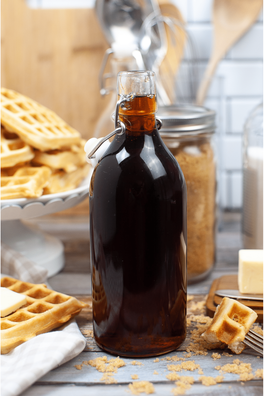 Delicious Homemade Pancake syrup made from brown syrup in tall bottle